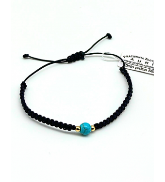 Bransoletka z błękitnym koralikiem i złotem 585 – elegancja i styl | AURI Pracownia Złotnicza