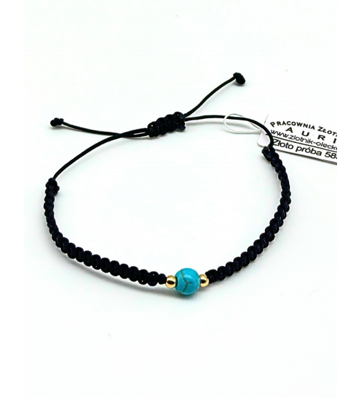 Bransoletka z błękitnym koralikiem i złotem 585 – elegancja i styl | AURI Pracownia Złotnicza